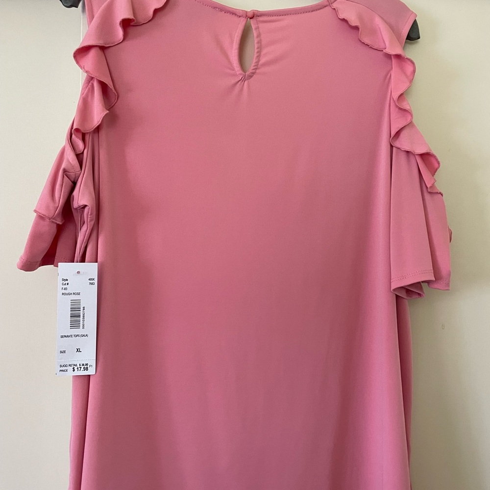 Pink cold shoulder top.